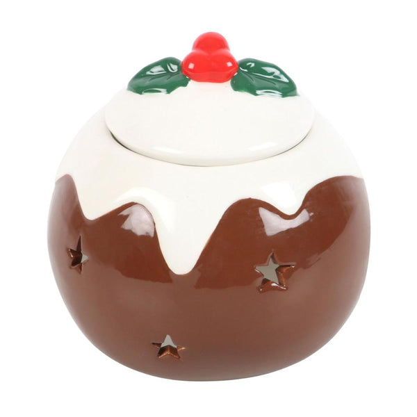 Ceramic Christmas pudding with holly on top on a white background