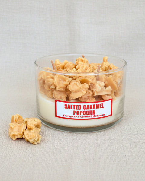 Jar of salted caramel popcorn with a label on a burlap background